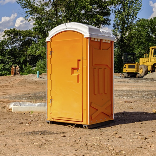 how often are the portable restrooms cleaned and serviced during a rental period in Hessel Michigan